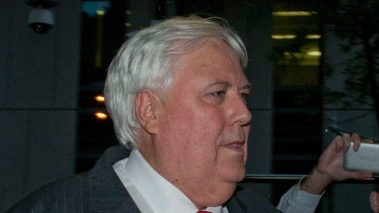 Clive Palmer leaves court.