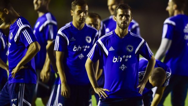 No wonder they look glum: Bosnia's players have been issued with a sex ban.