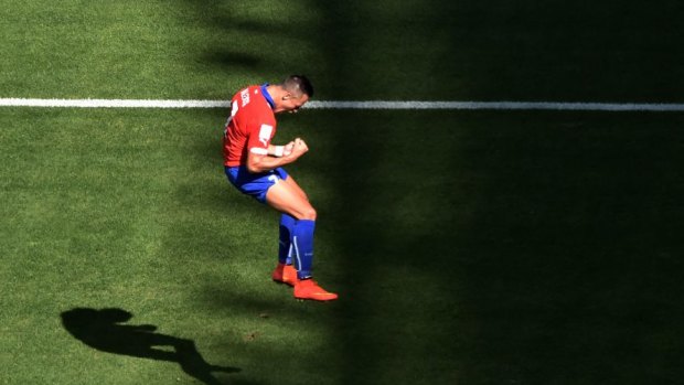 Alexis Sanchez celebrates scoring Chile's equaliser.