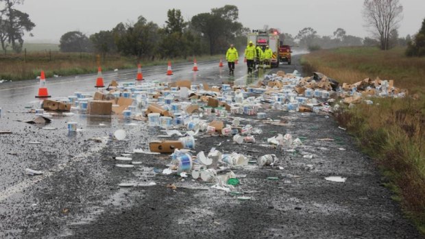 About 1.5 tonnes of yoghurt in tubs spilled on to a highway near Goulburn after a van overturned on Wednesday.