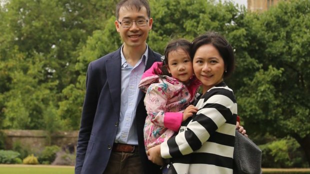 'I will not encourage our daughter to be a bookworm': Louis Wang and his family.