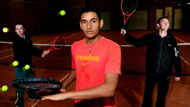 Nick Kyrgios has split again with his childhood coach Todd Larkham, right.