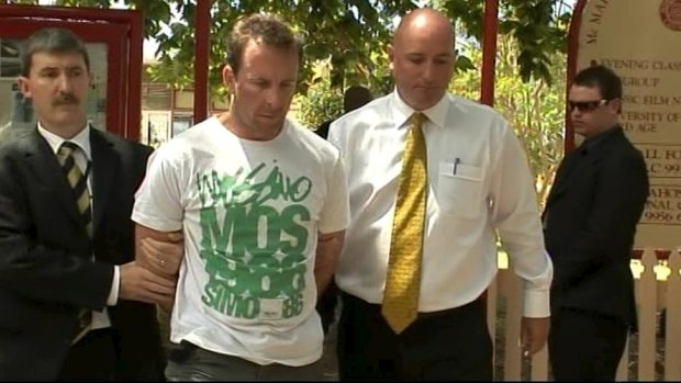 Sean Waygood is led away after his dramatic arrest at a cafe on Sydney's north shore in January 2009.