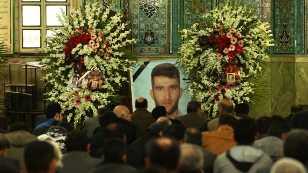 Mourners at the memorial service for Reza Barati, held at the Al-Mahdi mosque in the Nabard neighbourhood in South East Tehran, Iran.