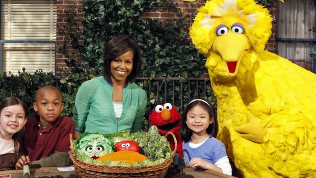 Michelle Obama with Big Bird and Elmo getting out her healthy-eating message in 2009.