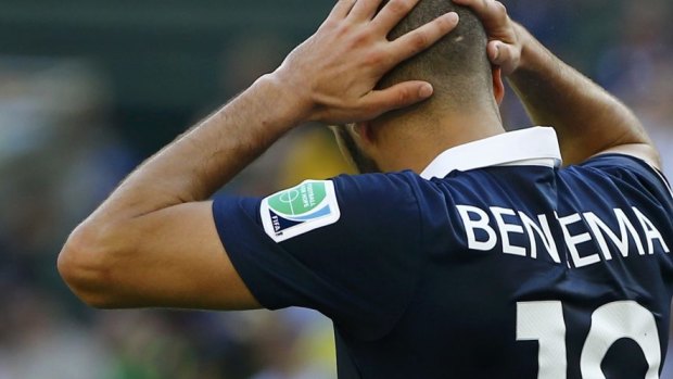 France's Karim Benzema reacts after missing a chance to equalise.