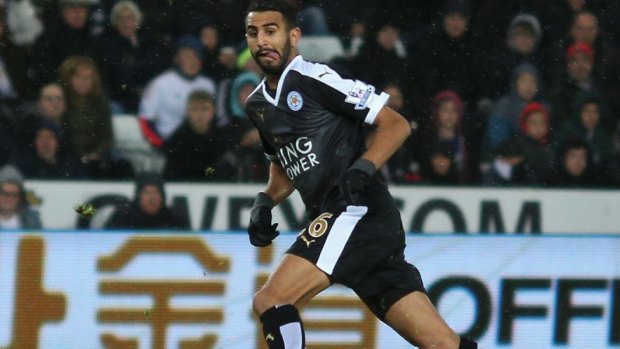 Dream year: Riyad Mahrez nets for Leicester.