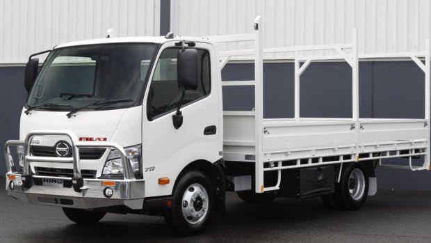 A white Hino tray truck similar to this one remains missing.