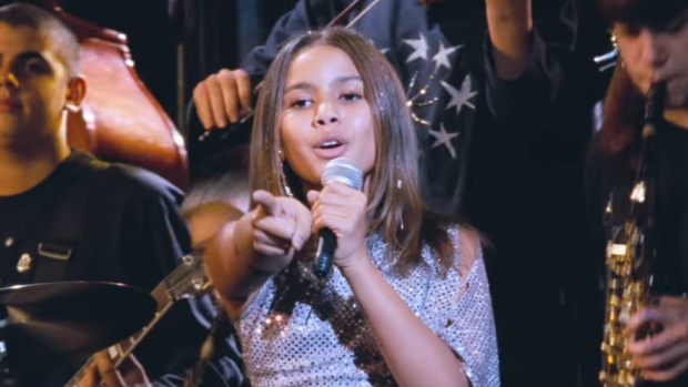 Olivia Olsen belts out Mariah's hit 'All I Want For Christmas Is You' in Love Actually.