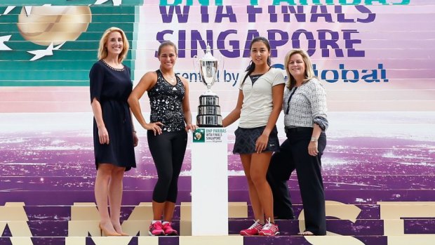 WTA Finals tournament director, Melissa Pine, rising stars Monica Puig of Puerto Rico and Zarina Diyas of Kazakhstan, and WTA chief executive Stacey Allaster pose for the cameras before the tournament began.