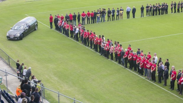 Teammates gathered around the field's edges as Ackermann was taken on a final lap of honour around the stadium.