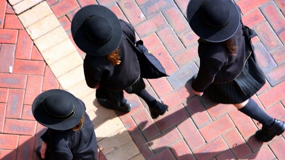 The court found the parents could not afford $50,000 in annual fees to send their children to private schools.