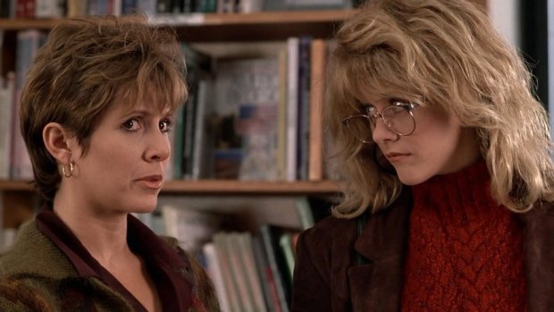 Carrie Fisher with Meg Ryan in <i>When Harry Met Sally</i>.