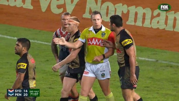 Touchy situation: Sam McKendry makes contact with referee Jared Maxwell during Monday night's game against the Sydney Roosters.