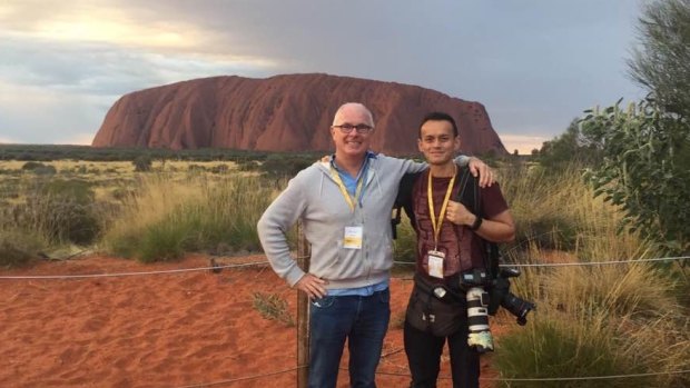 Michael Gordon on assignment with photographer Alex Ellinghausen in Uluru in 2017.