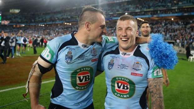 Bulldogs halves duo Josh Reynolds and Trent Hodkinson are all smiles after the Blues' 6-4 victory over Queensland.
