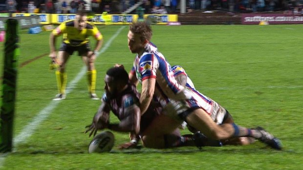 Controversy: Akuila Uate drops the ball over the line, but the try was awarded.