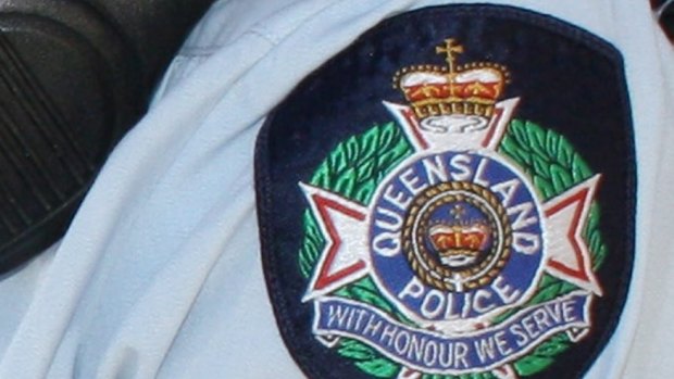 A man wanted for questioning over shots fired at a car and home in north Queensland could be armed, police say.