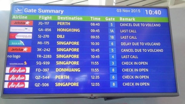 The departures board at Denpasar shows cancellations on Tuesday morning.