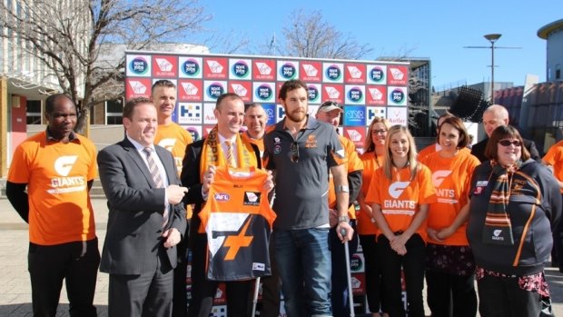 Andrew Barr received a signed Greater Western Sydney Giants guernsey.