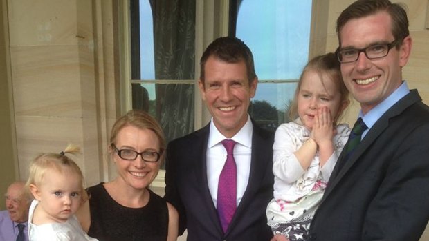 Dominic Perrottet, right, with the premier and some of his family during the election campaign.