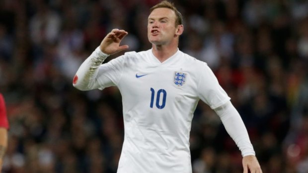 Wayne Rooney shouts instructions to a teammate.