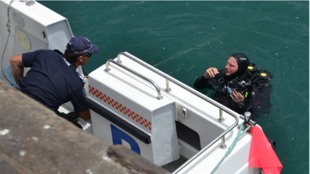 A police diver at Brennan Wharf in Port Lincoln.