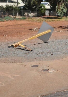 A street sign destroyed during the rampage.