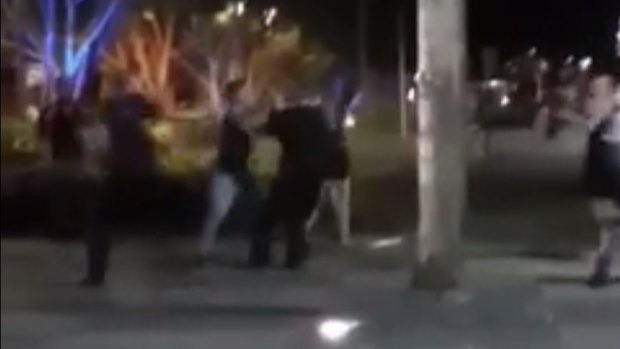 A Cairns man's Facebook Live video captured the alleged assault of a police officer on the esplanade.