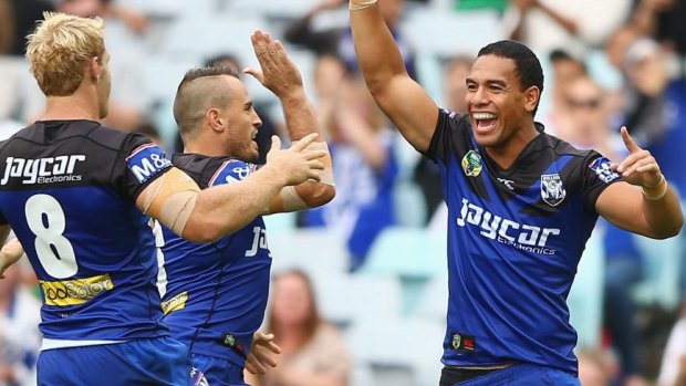 On fire: Will Hopoate celebrates scoring a try during round four.