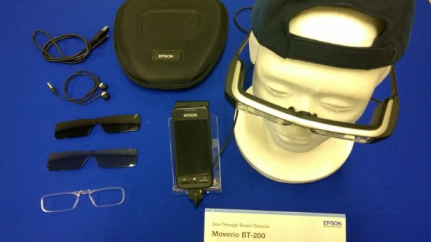 The Moverio BT-200 kit: smart glasses, sun shades, prescription frame, controller, cable, ear phones and case.