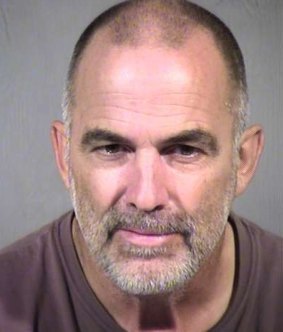 Paul Rater has been arrested after allegedly leaving his young granddaughter alone in the desert with a loaded gun. 