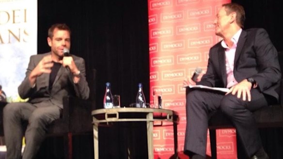 Cadel Evans with host Garry Maddox launches <i>The Art of Cycling</i> at a Dymocks Literary Club event in Sydney this week. 