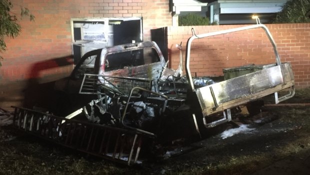 The burning ute crashed into an apartment block.