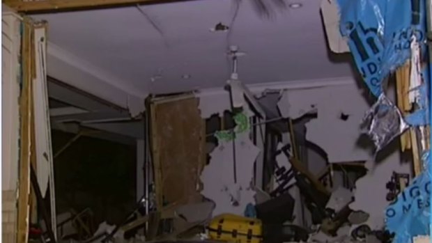 There were no injuries when a car was driven through a house in Brisbane.