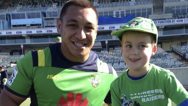 Jack Woodhams, 6, meets one of his Raiders heroes, Josh Papalii last year. Jack, who passed away in January, is a source of inspiration for the Kangaroos back-rower.