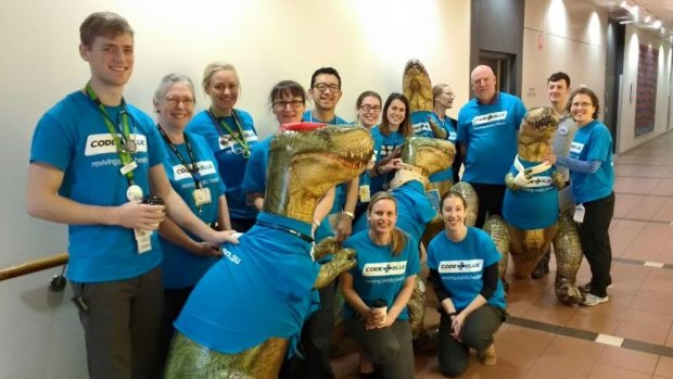 Allied health professionals from The Alred, preparing for their "Dino Rally" in Melbourne CBD on Thursday afternoon.