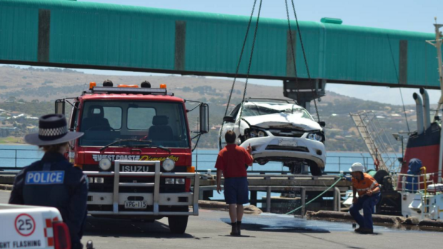 The Ford station wagon was hauled from the water on Monday afternoon