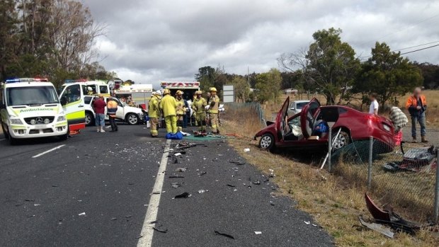 Three people have been injured in a head-on crash on the New England Highway, southwest of Brisbane.