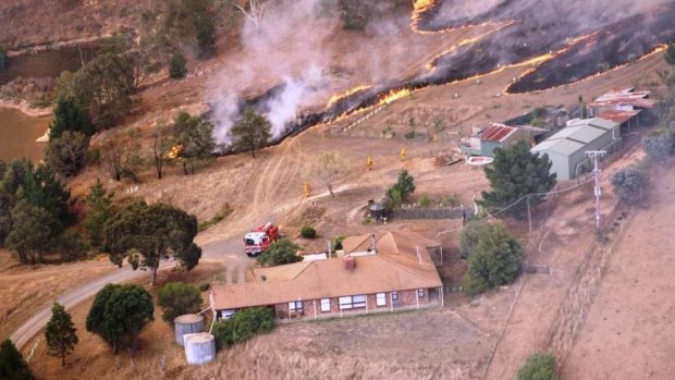 The bushfire threatens a home at Mount Bolton.