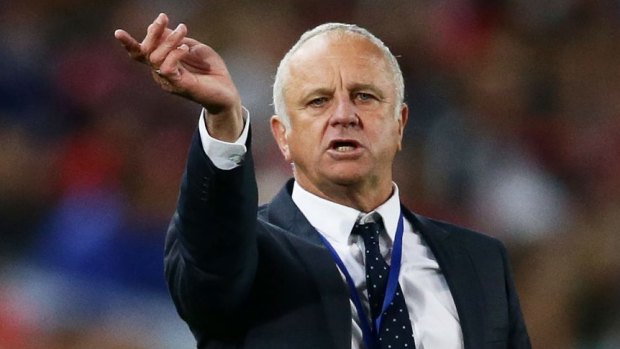 Sydney FC coach Graham Arnold read the text to the players before the match. 