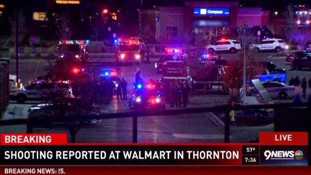 The scene was chaotic with police and witnesses unsure if the gunman was holed up inside the Walmart.