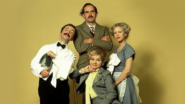 The original cast from the TV show: Manuel (Andrew Sachs), Basil Fawlty (John Cleese), Sybil Fawlty (Prunella Scales) and Polly (Connie Booth).