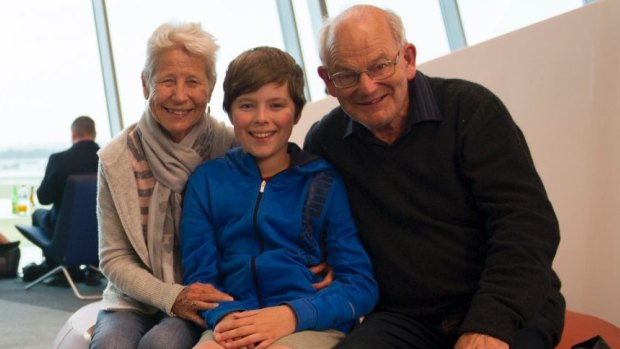 Martin and Sue Neveu with their grandson Ben Schmidt, 13, were catching the first Singapore Airlines Flight from Canberra to Wellington to visit family.