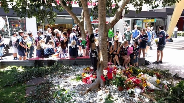 Barely a word was heard during the lunchtime memorial for Cole Miller in Brisbane's Chinatown Mall.