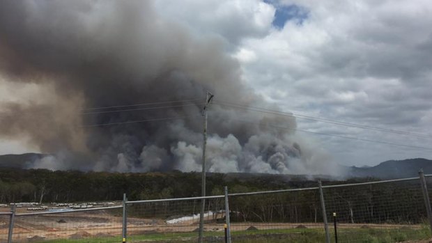 The Coolum bushfire continued to rage on Friday, as seen from the Peregian Springs water tower.