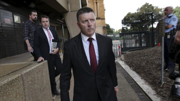 Out: Mike Gallacher leaves NSW Parliament House on Friday.