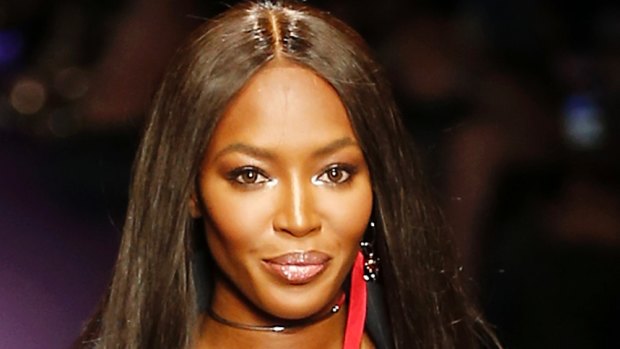 Naomi Campbell with a subtle yet shiny glow at Versace.