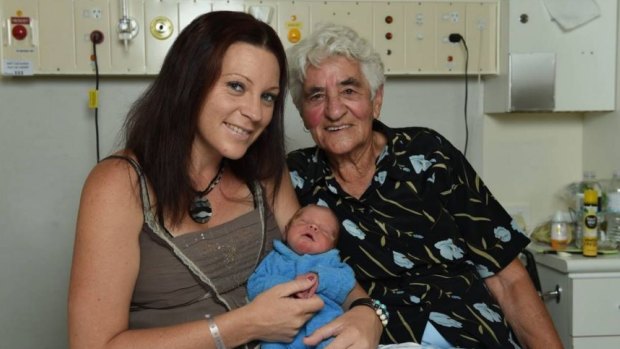 Mum Rikki Bennett, son Logan Peter and great-grandmother Dot Looker at Wodonga hospital on Monday following his dramatic entry to the world.