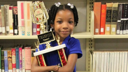 Girl born without hands wins national handwriting competition